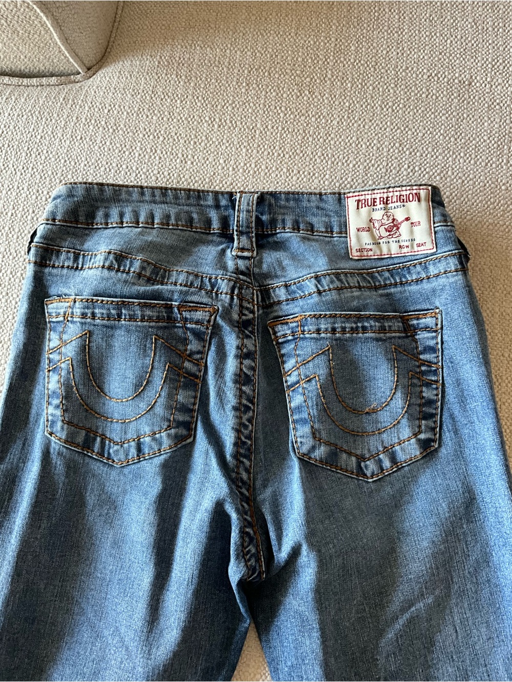 True Religion Light Blue Flare Jeans with Signature Back Pockets